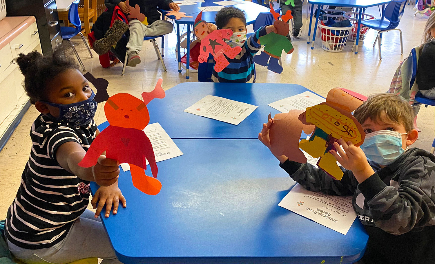 Brightly decorated "gingerbread" people in Mabee's Cooke School kindergarten class.